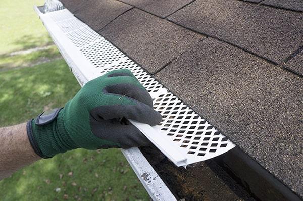 installing gutter guards will prevent debris from clogging your gutters and reduce the need for frequent cleaning